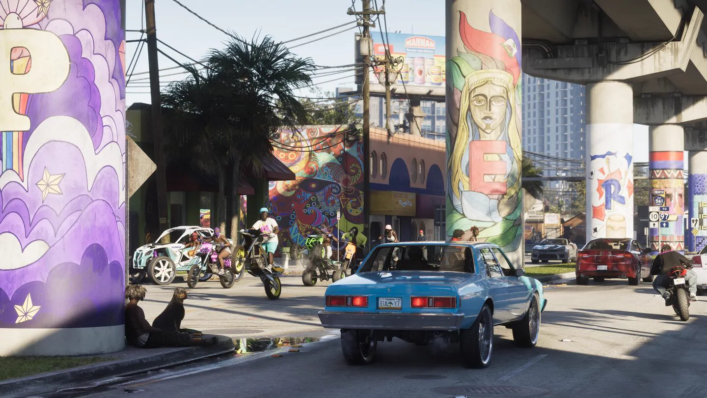 A vintage convertible parked on an Ocean Drive boulevard